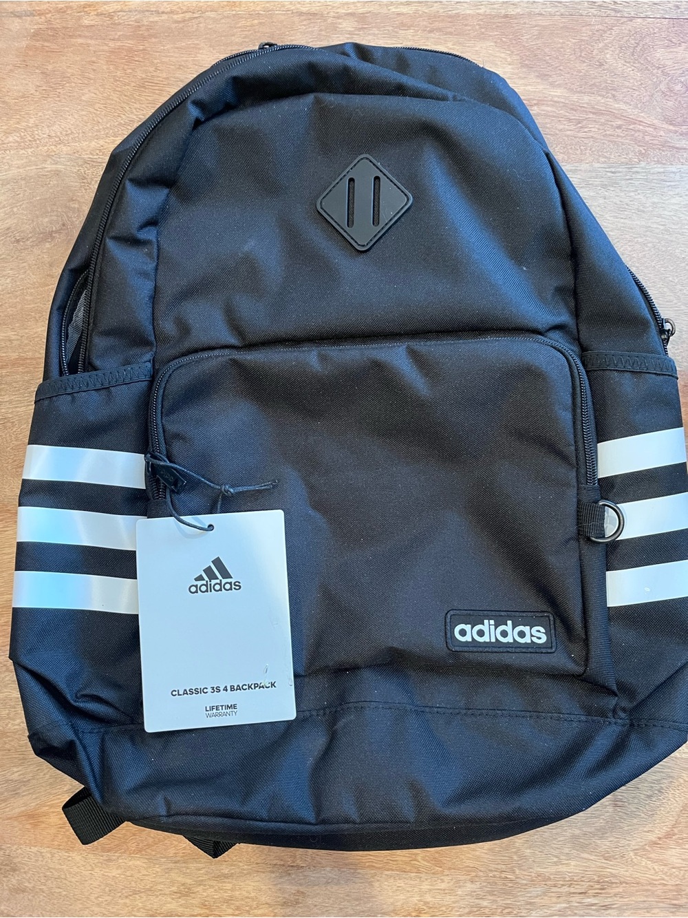 adidas Black Backpack with White Stripe Accents